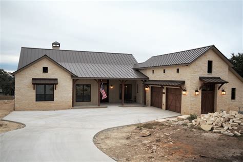 austin stone house with metal roof for sale|Brick and Stone Homes for Sale .